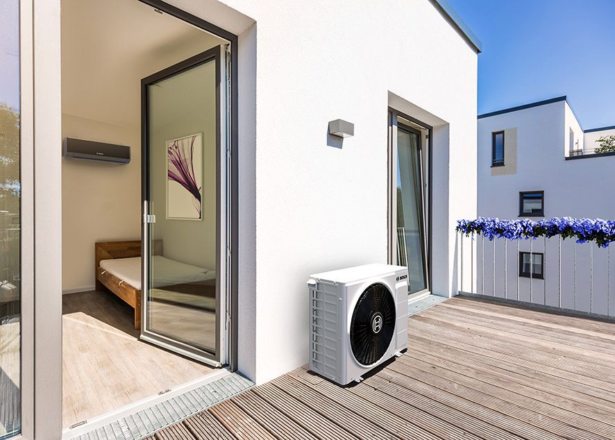 Balcony with sliding door and outdoor AC unit